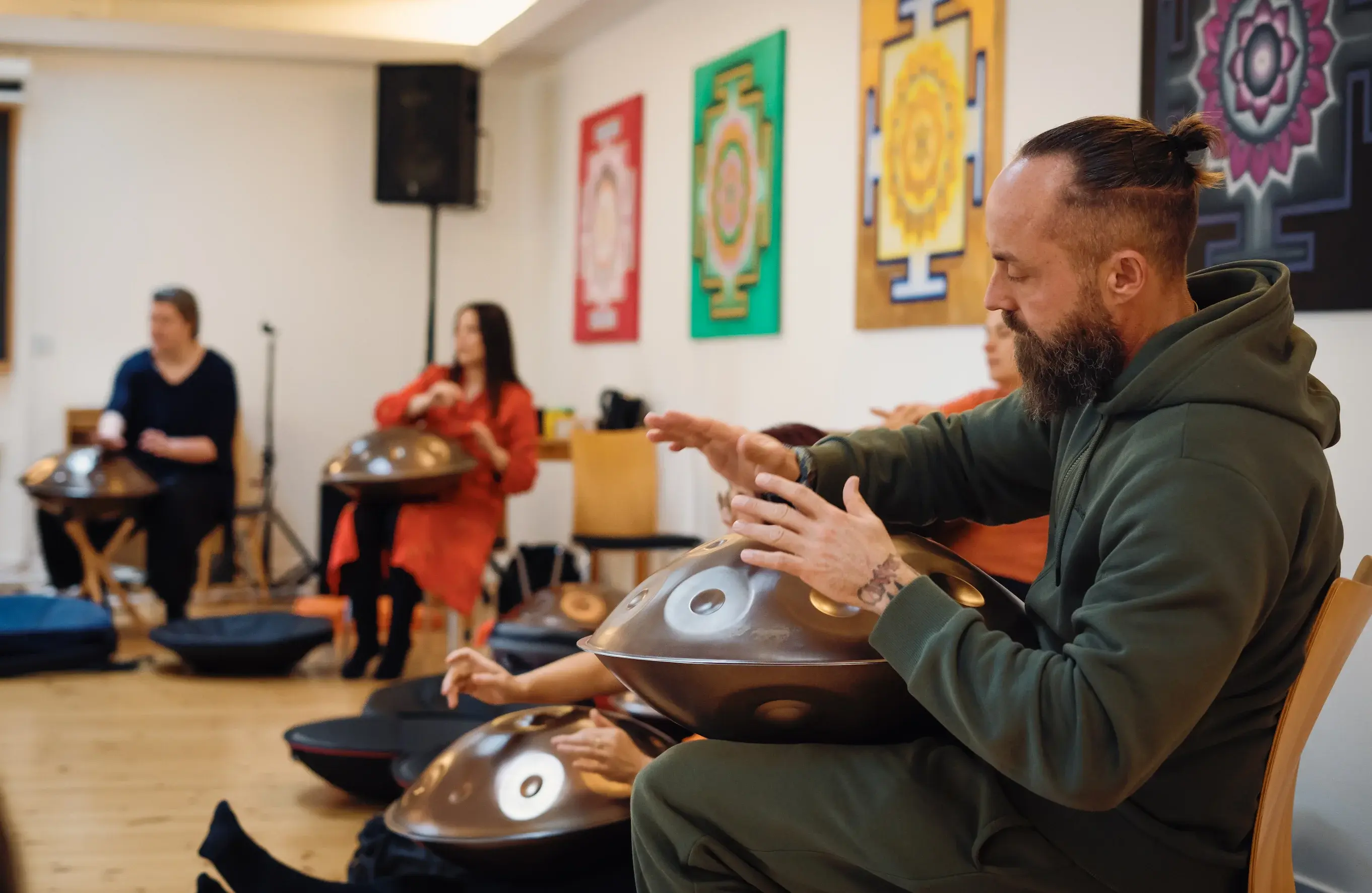 Team handpan session in a modern office